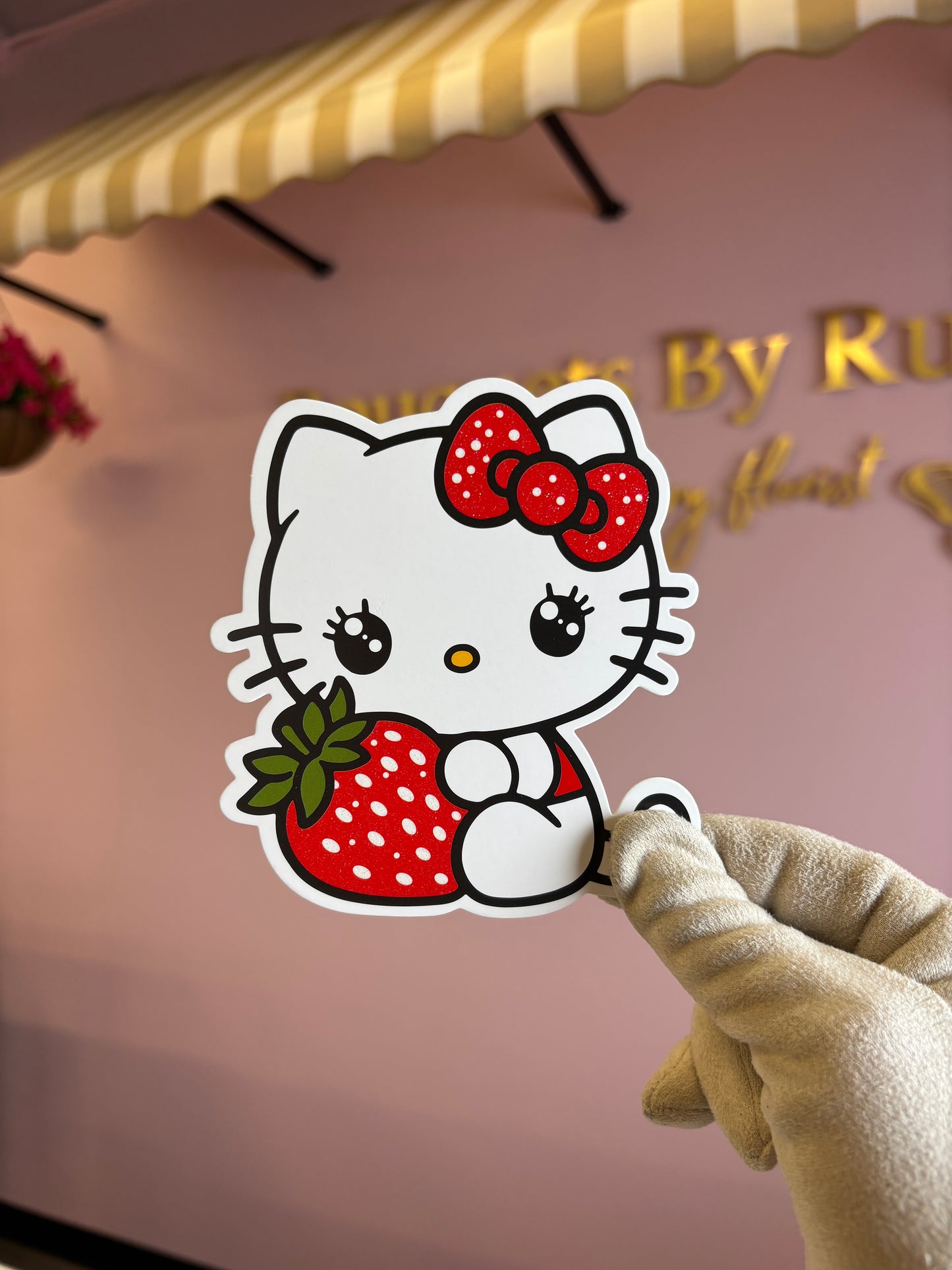 Hk holding strawberry sparkly eyes ✨