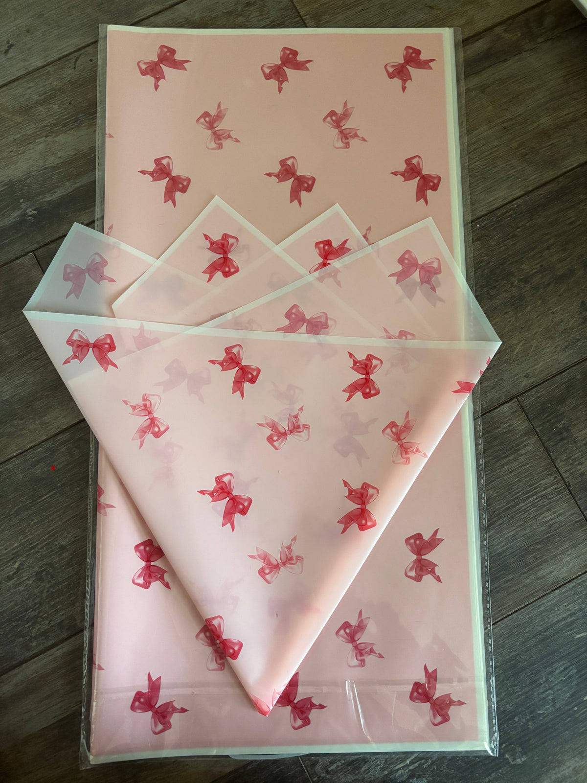 Transparent pink coquette bow (white edge)