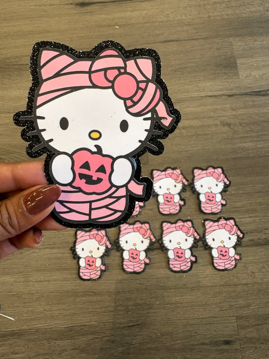 1Hello Kitty mummy with black glitter background